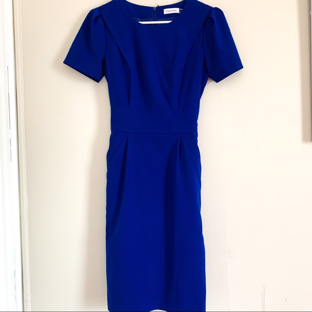 Blue Calvin Klein dress.